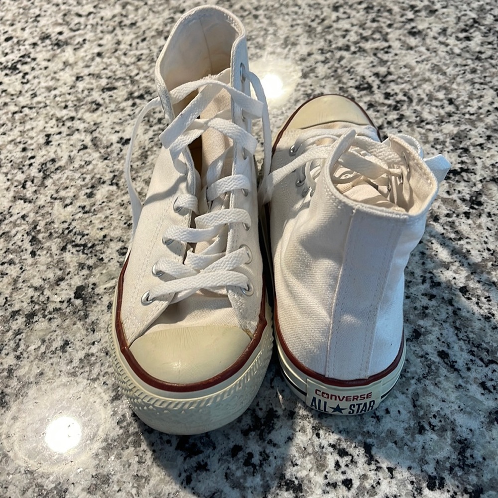 Good condition. Yellow spot on left shoe